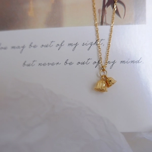 Elegant 18k gold plated titanium necklace featuring delicate double bell flower pendants