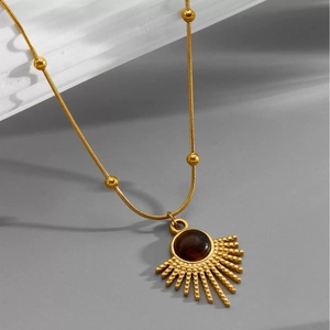Pendentif œil de tigre soleil sur collier chaîne serpent dorée pour femmes élégantes