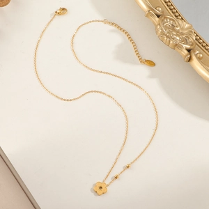 Elegant K18 gold plated titanium steel necklace with hollow peach blossom flower pendant