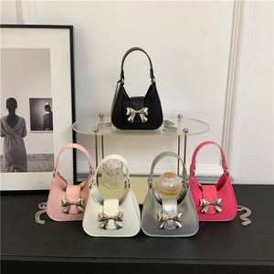 Hobo bag with gold bow clasp in black, pink, white, silver and rose red color options