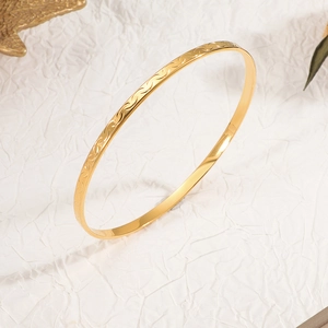 Bracelet jonc en acier titane doré 3,5 mm avec texture ondulée élégante et polie