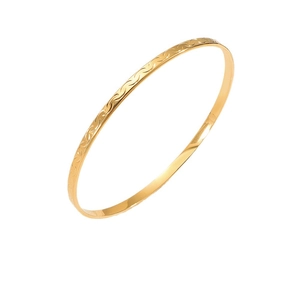 Bracelet jonc minimaliste de 3,5 mm en titane plaqué or avec texture de vagues gravée