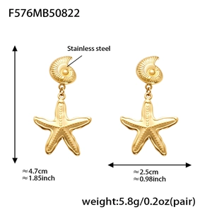 Detail view of gold stainless steel starfish and conch earrings with size measurements