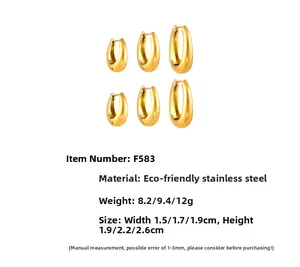 Trois tailles de boucles d'oreilles ovales dorées en acier poli avec mesures précises