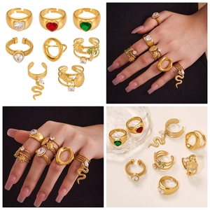 Detailed view of 8-piece 18k gold-plated ring set with 5A zircon and heart motifs