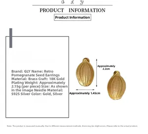 Macro detail of pomegranate seed earrings with 18K gold plating and S925 silver studs