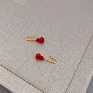 Minimalist red enamel gourd drop earrings with sleek gold hooks for a classic oriental style