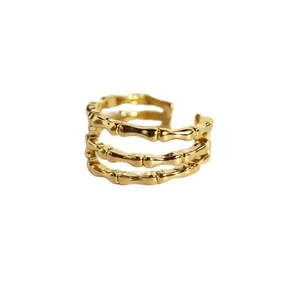 Elegant gold-plated triple-layer bamboo style open ring with a polished minimalist finish