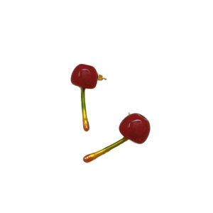 Cute cherry shaped stud earrings with vibrant red fruit and green stems on white background