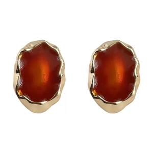 French vintage gold earrings with red-brown enamel inlay and wavy texture edges