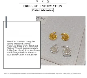 Macro detail of irregular spring earrings in 18K gold plated brass with S925 silver pins