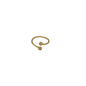 Adjustable gold plated ring featuring delicate dual flower design with crystal accents