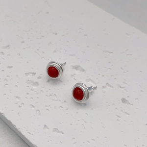 Vintage round silver earrings with red agate inlay and textured wavy edge design