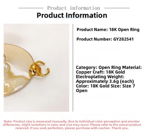 Macro detail of adjustable 18K gold plated geometric ring showing the glossy finish