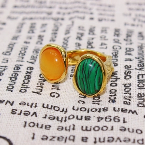 Vintage gold adjustable open ring featuring teardrop orange and green malachite stones
