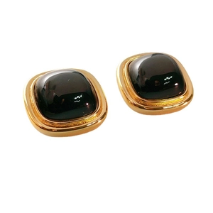 Classic 18K gold plated square earrings with smooth black gemstones on white background