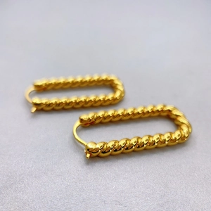 18K gold-plated rectangular twisted rope hoop earrings with a polished metallic finish