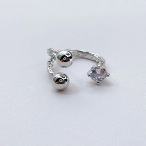 Adjustable silver branch textured ring with shiny beads and a sparkling cubic zirconia