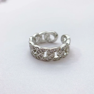 Adjustable silver Cuban link ring with pavé-set cubic zirconia in a minimalist style