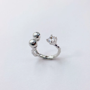 Irregular textured silver adjustable ring with zircon and double ball accents