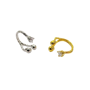 Adjustable 18K gold and silver plated ear cuff with zircon in organic lava texture