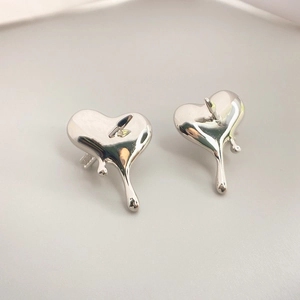 Polished S925 sterling silver heart stud earrings with liquid metal melting design