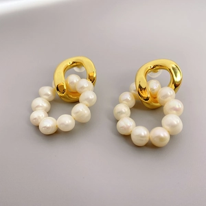 Fashion 18K gold plated hoop earrings with round cultured pearls in a minimalist design