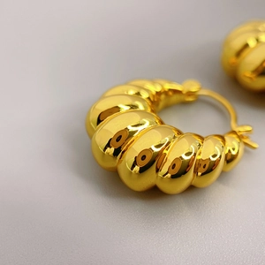 Polished 18K gold plated spiral hoop earrings with elegant ribbed texture for women