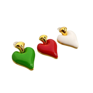 Three colorful heart-shaped enamel drop earrings in green, red, and white with gold plating