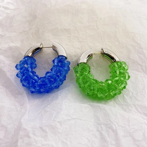 Exaggerated silver crystal beaded hoop earrings in blue and green color variants