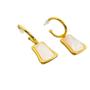 Golden C-shaped drop earrings with inlaid shell rectangles on a white background