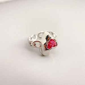 Silver heart ring with red gemstone, irregular liquid lava design and chain band