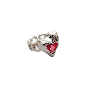 Adjustable silver ring featuring a red heart-shaped gemstone and chain texture band