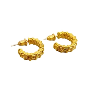 18K gold-plated C-shaped hoop earrings with unique textured woven design on white background