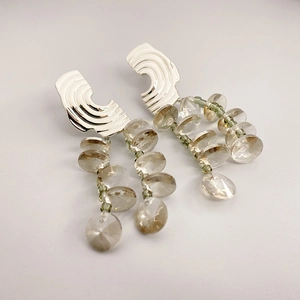 Silver compass pattern brass drop earrings with amber beads and green accents