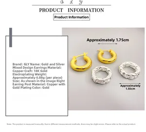 Detail view of gold and silver mixed-tone earrings with size specifications and 18K plating