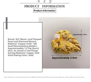 Detailed specs of the gold leaf brooch with cultured pearl and green diamond embellishment