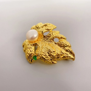 Golden leaf brooch with white pearl and green gemstone inlay, 18K gold plated finish