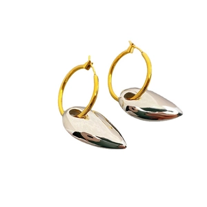 Fashionable gold hoop earrings with silver teardrop pendants and polished mirror finish