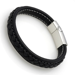 Detail of black braided leather bracelet with a polished silver magnetic steel clasp