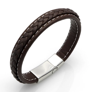 Macro detail of dark brown braided leather bracelet with silver magnetic metal clasp