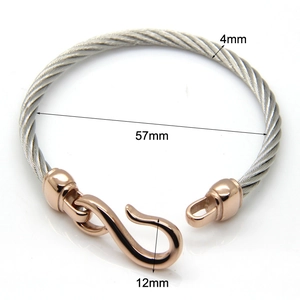 Macro view of 4mm steel cable bracelet showing inner diameter 57mm and rose gold hook