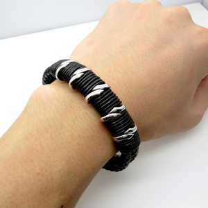Men's double-layered braided black leather bracelet with silver titanium steel ornaments