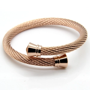 Rose gold stainless steel twisted cable open bracelet with polished geometric end caps