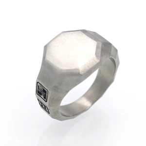 Men's 316L stainless steel ring with brushed geometric hexagon design on white background