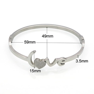 Silver LOVE frosted heart bangle in stainless steel with key dimensions 59mm and 49mm