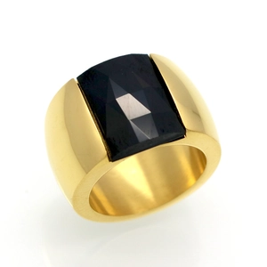 Polished gold wide band ring with emerald cut black onyx stone set in minimalist style