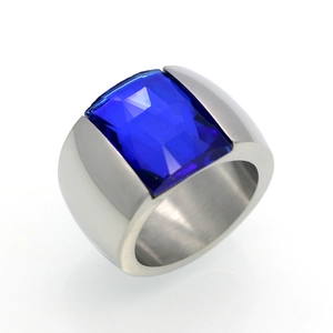 Close-up of brushed silver titanium steel ring featuring a square blue gemstone inlay