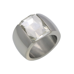 Macro detail of wide titanium steel ring with a large rectangular cut clear crystal stone