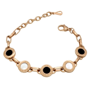 Detailed close-up of 18KGP rose gold bracelet with Roman numerals and black white shells